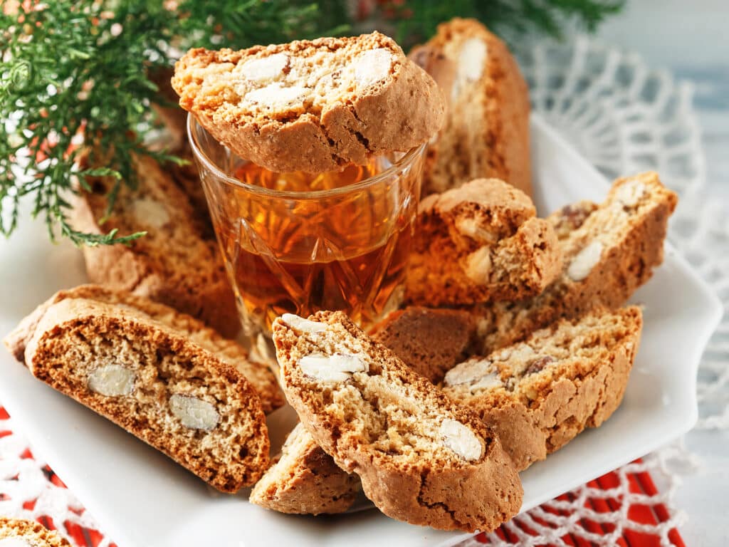 Traditional Italian cantuccini biscuits and a glass of sweet Vin Santo wine